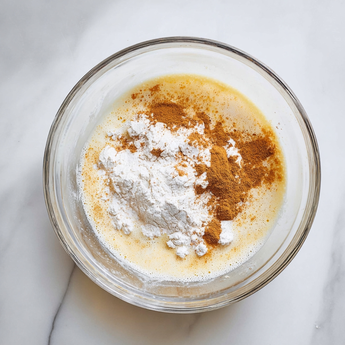 Add the flour, salt, cinnamon, and allspice. Use a spatula to gently fold everything together until just combined. Don't overmix.